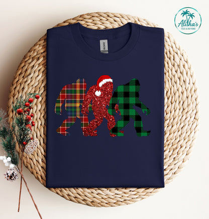 Bigfoot Trio Christmas T-Shirt — Holiday Sasquatch Plaid Tee